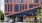 a large brick building and people